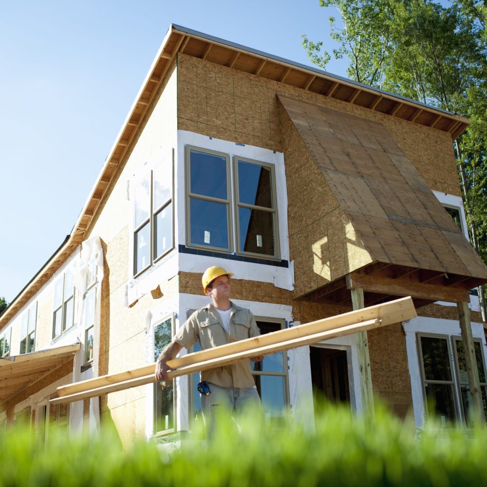 A construction site, a domestic house being built in a rural setting in New York State, USA